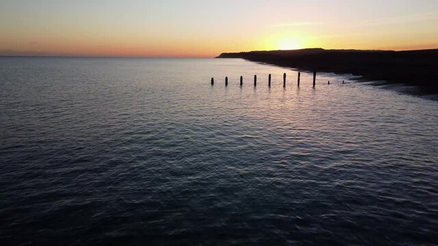 Sunset over sea and beach
