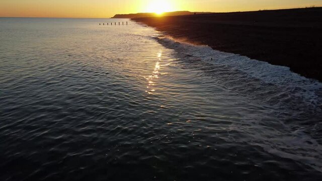 Sunset over sea and beach