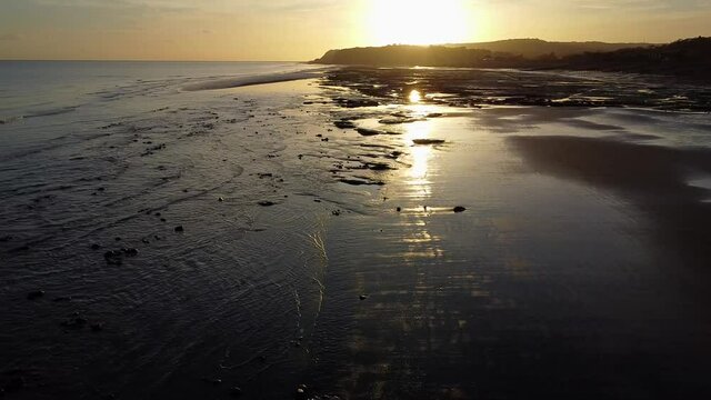 Sunset over sea and beach