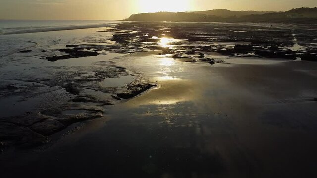 Sunset over sea and beach