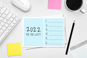 2022 Happy New Year Resolution Goal List and Plans Setting - Business office desk with notebook...