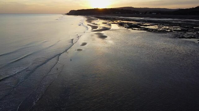 Sunset over sea and beach