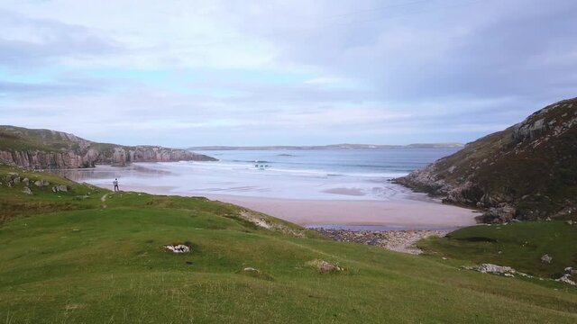 4K Beach landscape of the beach and sea, cloudy day in Scotland