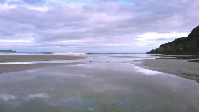 4K Beach landscape of the beach and sea, cloudy day in Scotland