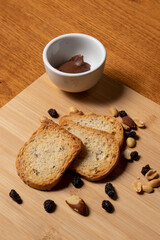 toast, chestnut mix and hazelnut cream served in afternoon tea on a wooden board, approximate photo