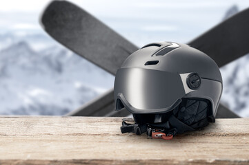 ski helmet with visor on mountains background. Modern grey helmet with sun visor on mountains background. winter sports helmet. Mountain Resort