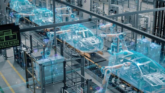 Car Factory Digitalization Industry 4.0 5G IOT Concept: Automated Robot Arm Assembly Line Manufacturing High-Tech Electric Vehicles. AI Computer Vision Analyzing, Scanning Production Efficiency