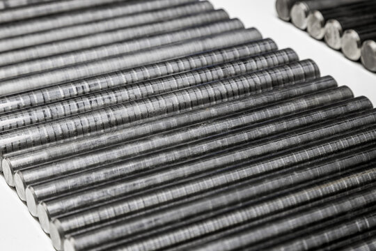 steel rods of different diameters on a light