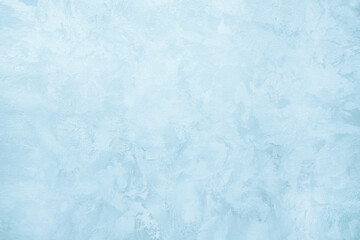 blue background with the texture of decorative plaster under silk