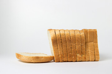 Sliced toast bread on a white plate. Bakery product