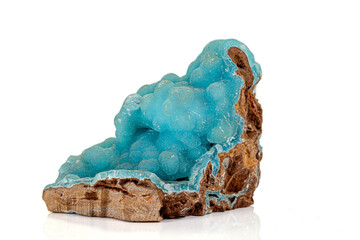 Macro pink Smithsonite mineral stone on microcline on white background