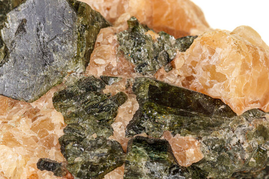 Macro of a mineral stone Vesuvianite on a white background