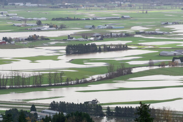 Devastating Flood Natural Disaster in the city and farmland after storm. Abbotsford, Greater...