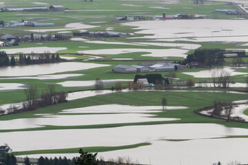 Devastating Flood Natural Disaster in the city and farmland after storm. Abbotsford, Greater...