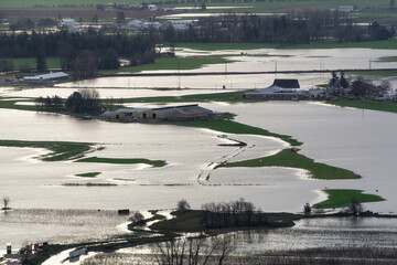 Devastating Flood Natural Disaster in the city and farmland after storm. Abbotsford, Greater...