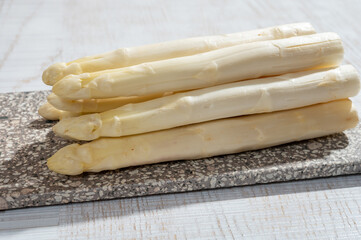 New harvest of high quality Dutch white asparagus washed, uncooked