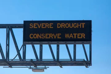 Foto op Plexiglas Freeway Sign Stating Severe Drought Conserve Water © F Armstrong Photo