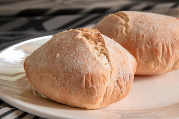 Two loaves of freshly baked bread