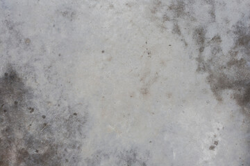 Grey cracked concrete grunge background textured wall. Copy space abstract cement design