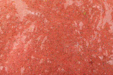 Liquid art gel background. Abstract textured coral background transparent slime with bubbles inside. Macro of kids toy slime.