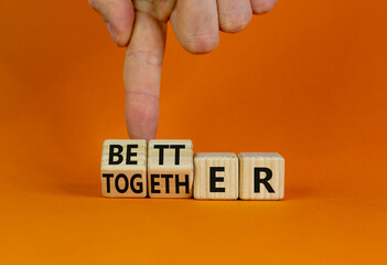Better together symbol. Businessman turns cubes and changes the word together to better. Beautiful...