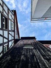 Exciting mixture of old and new architecture in medieval Feldkirch, Vorarlberg, Austria. Low angle view.