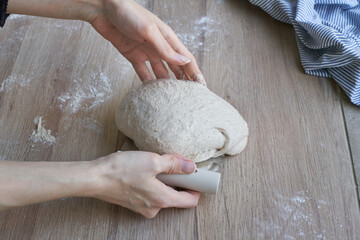 Kneading the dough for sourdough bread