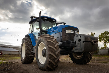 Big blue modern tractor.