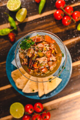 Colorful Food Appetizer Starts Snacks Fresh Delicious Menu Recipe Meal Meat Chicken Fries Fish Seafood Beer on a wooden table on the Beach