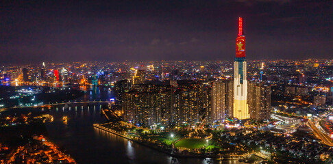 Ho Chi Minh city skyline at night - obrazy, fototapety, plakaty