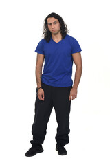 Fototapeta premium front view of a man with sportswear serious and looking at camera on white background