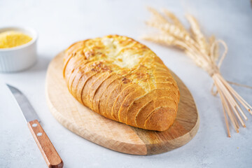 Corn wheat white bread with glasses of water