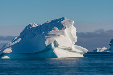 Huge iceberg floating in the sea off the coast of Disko Island, Greenland