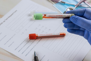 COVID-19 of B.1.1.529 new version Omicron epidemic virus outbreak Coronavirus infected blood test sample doctor hands.