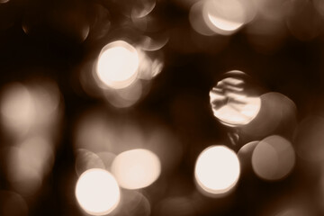 Blurred lights brown background. Abstract bokeh with soft light