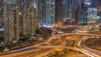 Fototapeta na wymiar Dubai Marina highway intersection spaghetti junction night timelapse