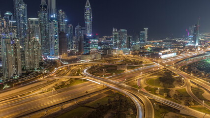 Fototapeta na wymiar Dubai Marina highway intersection spaghetti junction night timelapse