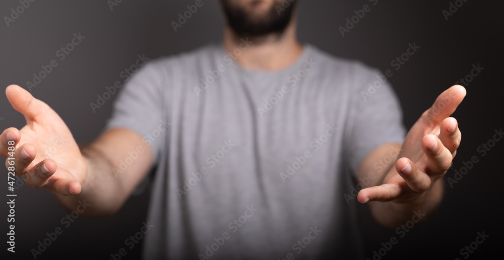 Poster man showing his empty hand.