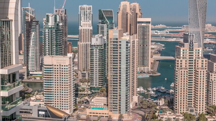 Canal in Dubai Marina with luxury skyscrapers around timelapse, United Arab Emirates
