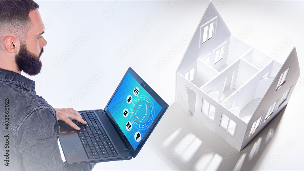 Poster designing a smart home system for a cottage. a man with a laptop is engaged in setting up and managi