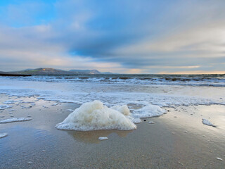 Sea Foam on the Beach at Lyme Regis