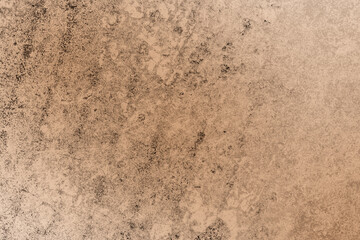 Brown grunge concrete texture with cracks for background