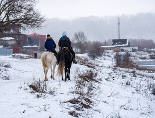 Horseback riding in winter on horseback riders