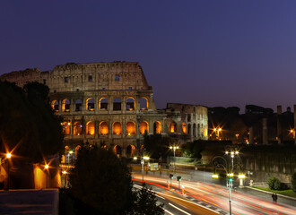 colosseum at night with light trails, Rome Italy