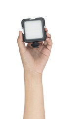 hand holding LED Video Camera Light square panel lamp isolated on white background