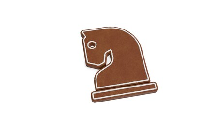 3d rendering of gingerbread symbol of chess knight isolated on white background
