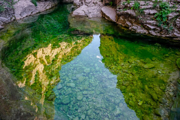 Naklejka na ściany i meble Malachite water in the Salta gorge in Dagestan