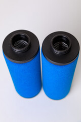 Air filters for a compressor with foam rubber, on a white backgroun