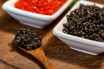 Black sturgeon and red salmon caviar close up