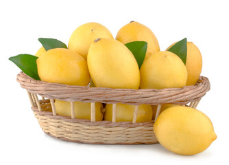 Lemons in basket isolated on white